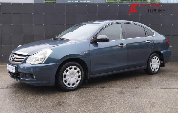 Nissan Almera 2013 года с пробегом 270 000 км, фото 1